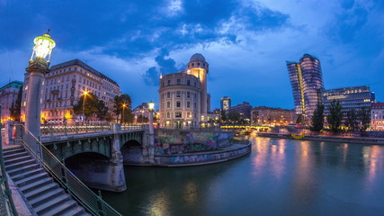 Wall Mural - Urania and Danube Canal day to night timelapse in Vienna.