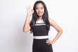 © halfbottle - Young Asian woman show OK sign.