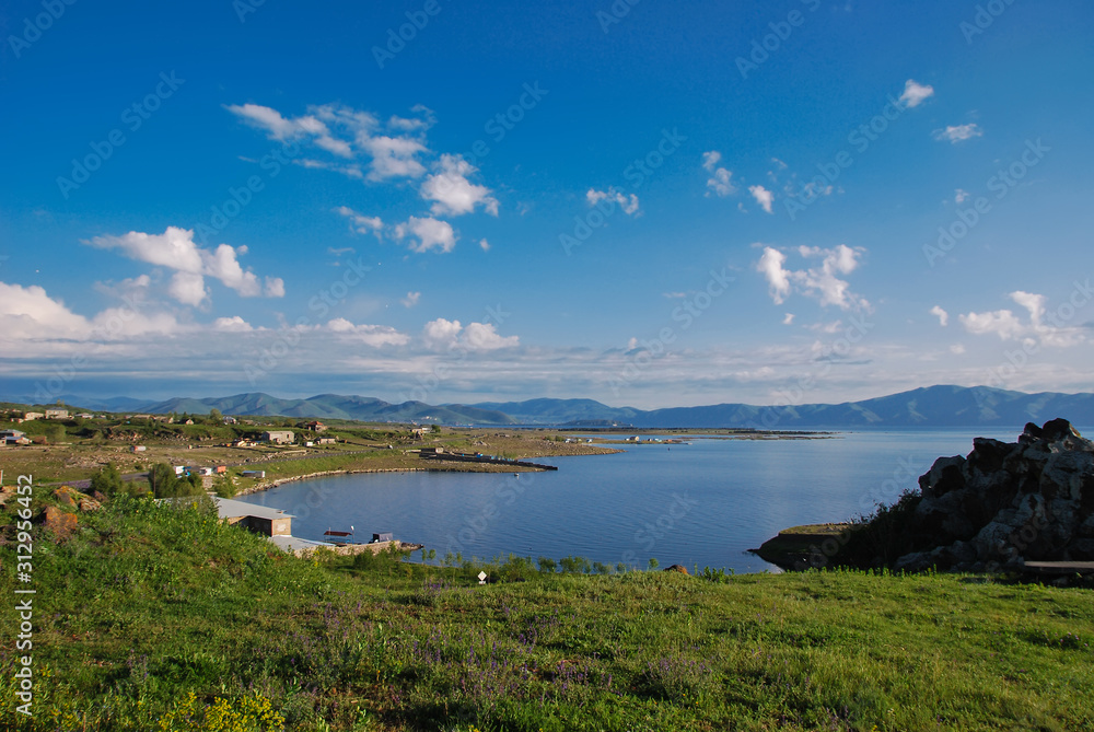 Photo Stock Beautiful view of Sevan lake with turquoise water and green ...