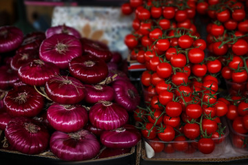 Fresh ripe vegetables on counter at wholesale market