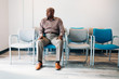 © Gerald Carter/Creative Flame - Mature man waiting in medical office