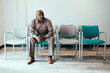 © Gerald Carter/Creative Flame - Mature man waiting in medical office