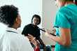 © Gerald Carter/Creative Flame - Male patient listening to doctor and nurse