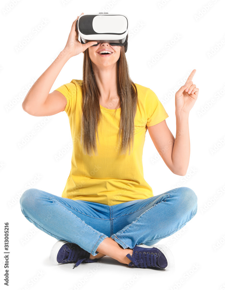 Young woman with virtual reality glasses on white background