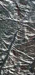 Wall Mural - vertical abstract photography of the deserts of Africa from the air, aerial view of desert landscapes, Genre: Abstract Naturalism, from the abstract to the figurative, 