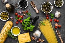 Italian Food Or Mediterranean Diet Ingredients For Cooking On Dark Background