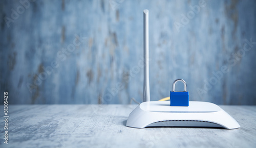 Fotografía Internet router with padlock. Network and data protection