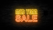 © Singha - Mid year sale letter on the black brick wall for promotion sale and for clearance sale and for promote sale season.