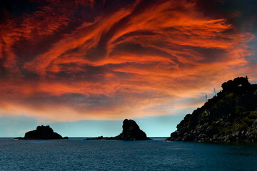 Wall Mural - crazy sky over land and sea