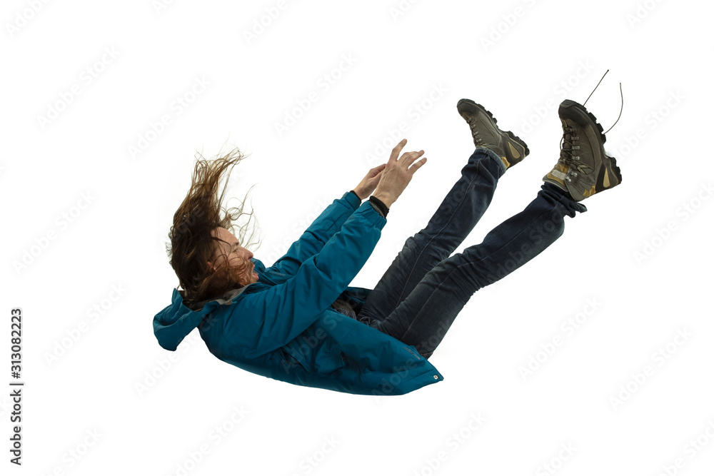 A second before falling. Caucasian young man falling down in moment with bright emotions and facial expression. Male model in casual clothes on white. Shocked, scared, screaming. Copyspace for ad. - obrazy, fototapety, plakaty 