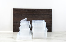 Lot Of Empty Clear Plastic Storage Boxes Stacked. Ready For Home Organizing Sorting Concept.