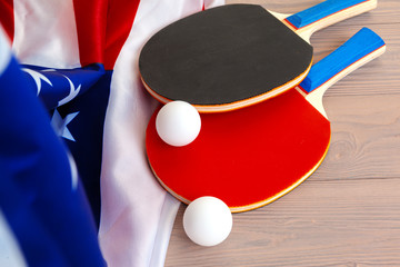 Ping pong equipment on wooden table close up