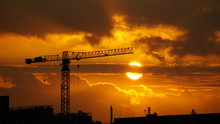 Construction Crane At Sunset