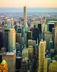 Wall Mural - Aerial panoramic view to Midtown Manhattan and Central Park, NYC, USA. Skyline with skyscrapers at sunset. New York city. American architecture building. Panorama of Metropolis. Cityscape