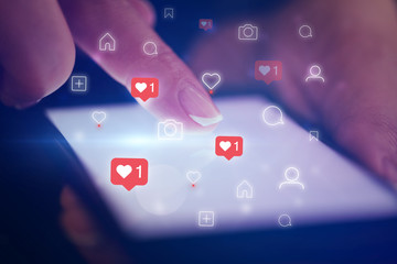 finger touching phone with social media concept and dark background