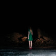 © Atte Tanner - Girl with green dress alone on dark road
