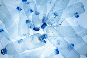 Abstract background of plastic bottles (Polyethylene Terephthalate or PET bottle). Global warming and World environmental concept