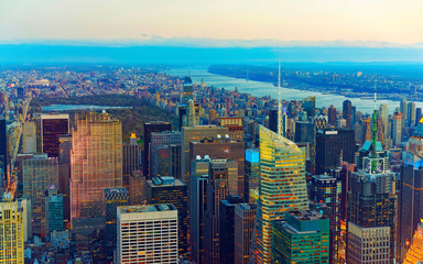 Wall Mural - Aerial panoramic view to Midtown Manhattan and Central Park, NYC, USA. Skyline with skyscrapers at sunset. New York city. American architecture building. Panorama of Metropolis. Cityscape