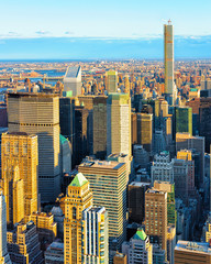 Wall Mural - Aerial panoramic view. on Midtown district of Manhattan in New York. Hudson river is on the background. Metropolitan City skyline, USA. American architecture building. Panorama of Metropolis NYC