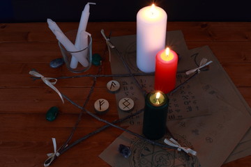 occult magic symbolism and ritual with runes and Tarot cards