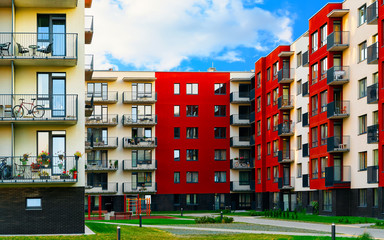 Apartment in residential building exterior. Housing structure at blue modern house of Europe. Rental home in city district on summer. Architecture for business property investment, Vilnius, Lithuania.