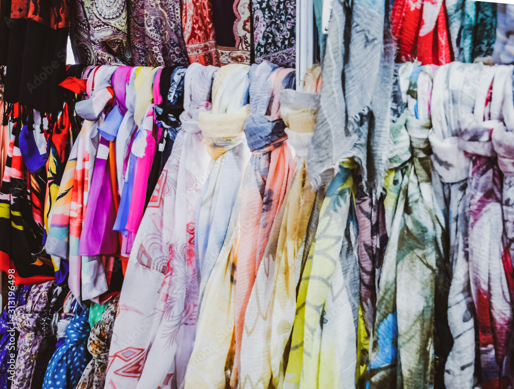 Indian fabrics hanging on the counter. Trade in fabrics from india ...