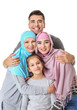 © Pixel-Shot - Portrait of Muslim family on white background