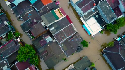 Wall Mural - Aerial POV view Depiction of flooding. devastation wrought after massive natural disasters. 2.7K resolution video