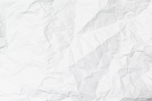 A White Crumpled Paper Texture Overlay Background