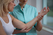 © Photographee.eu - Senior female patient Working With young professional Physiotherapist