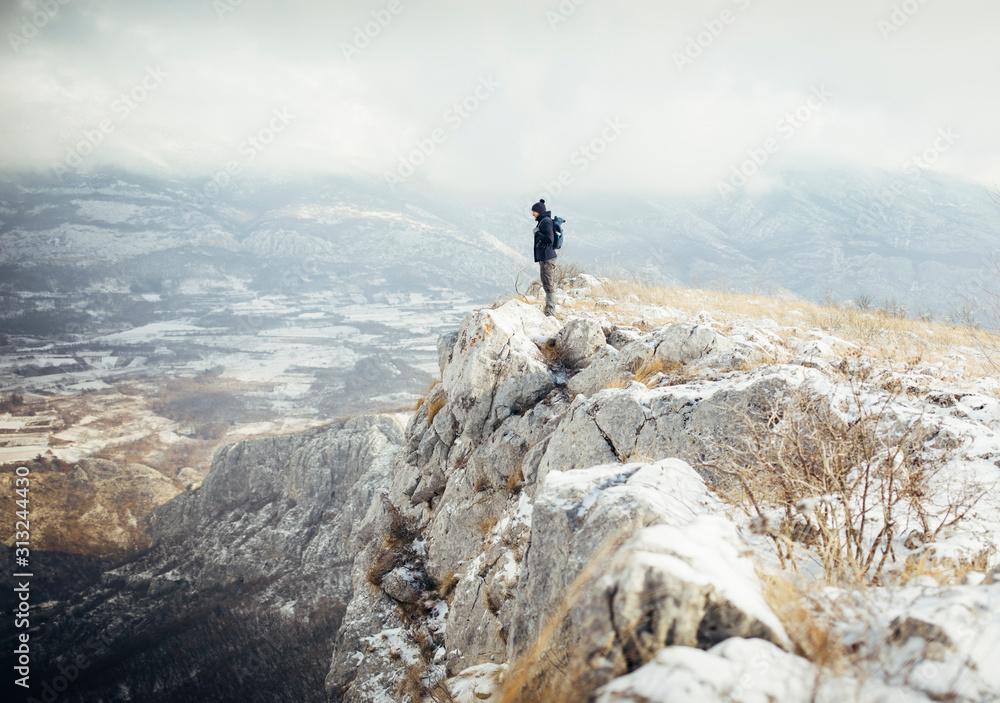 Hiker standing at mountain viewpoint, travel lifestyle hiking wanderlust concept - obrazy, fototapety, plakaty 