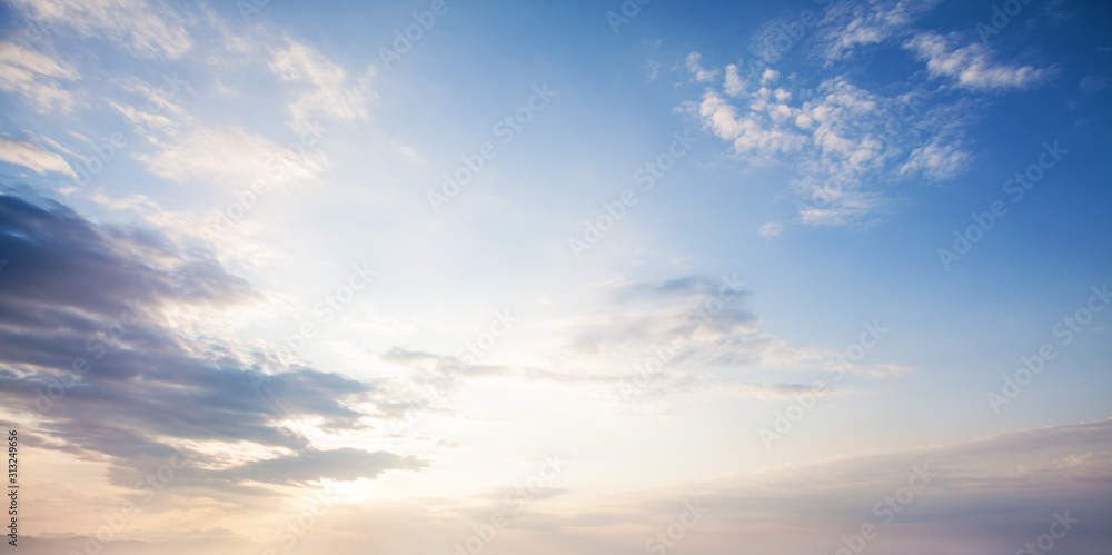 Blue sky clouds background. Beautiful landscape with clouds and orange sun on sky - obrazy, fototapety, plakaty 