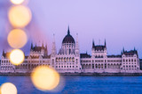 Fototapeta Londyn - Heart from lights at the background of Parliament building of Budapest, Hungary, banner
