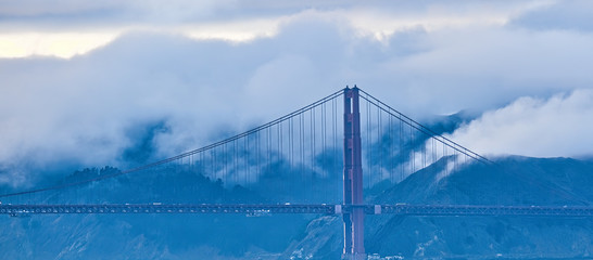 Fototapete - Golden Gate Against Foggy Hills from the Bay