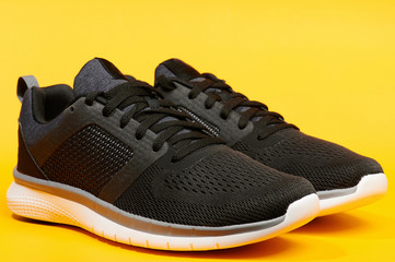 Canvas Print - Pair of modern black running shoes