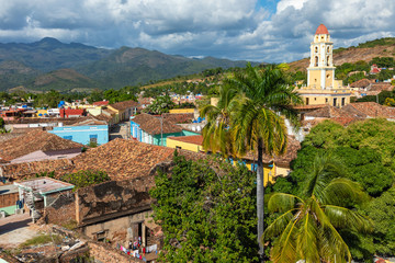 Wall Mural - Trinidad, panoramic skyline with mountains and colonial houses. The village is a Unesco World Heritage and major tourist landmark in the Caribbean Island. Cuba.