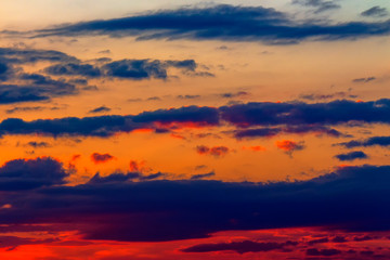 Wall Mural - orange sunset sky with clouds. beautiful nature background