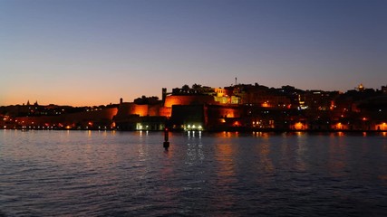 Wall Mural - City of Valletta in Malta, evening view from the Grand Harbour, zoom in shot.