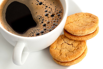 Wall Mural - Cup of black coffee with biscuits.