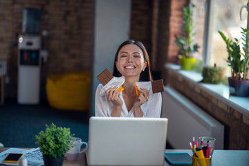 Happy delighted woman wanting to eat chocolate