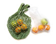 Green Hand-Made Crochet Eco-Friendly String Shopping Bag with Green Apples and Tangerines  VS Plastic Bag on White Background Flat Lay. Concept of Ecology, Environmental Protectio                     