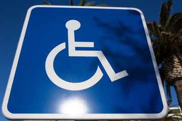 Sign for disabled parking close-up. A clear sunny day.