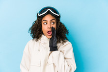 Young African American Skier Woman Isolated Is Saying A Secret Hot Braking News And Looking Aside