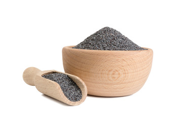 blue poppy seeds in wooden bowl and scoop isolated on white background. food ingredient.