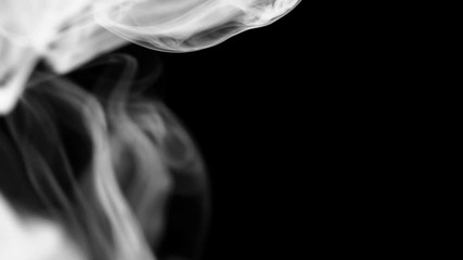 Wall Mural - Plumes of real white smoke on a half frame on a contrasting black background. The concept of transitions for video editing using the alpha channel. Effects for double exposure and contrast abstract.