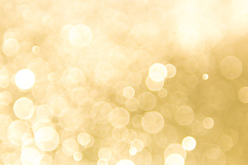 gold background with light bokeh. abstrat background