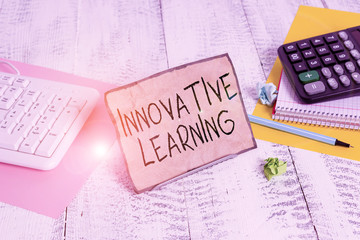 Wall Mural - Text sign showing Innovative Learning. Business photo showcasing Interdisciplinary teaching that stirs analytic thinking Notepaper stand on buffer wire in between computer keyboard and math sheets