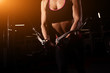 © Sibashouse - Strong Sporty girl in gym doing exercises.