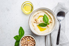 Bowl Of Healthy Homemade Creamy Chickpea Hummus Dip With Olive Oil, Top View