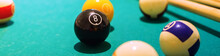 Billiard Ball Figure Eight On A Table With Cues